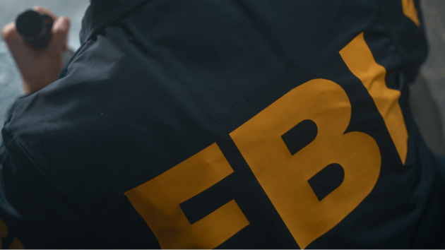 Suspect sought after car rams FBI gate in potential ‘act of terror,’ official says